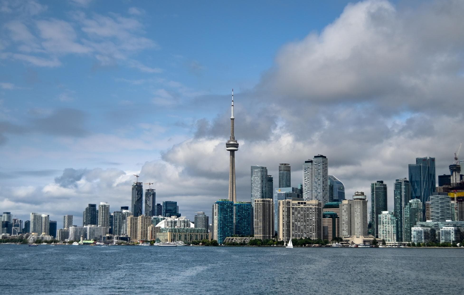Canadian skyline — where underwriting, advisory, and client coordination happen